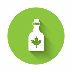 White Bottle of maple syrup icon isolated with long shadow background. Green circle button. Vector