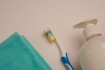 bathroom items hygiene care toothbrush light background