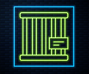 Glowing neon line Animal cage icon isolated on brick wall background. Vector
