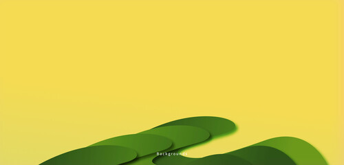 Green abstract shape isolated on a yellow background, looks like a plant in the afternoon.