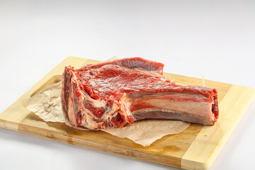 Raw bones for cooking over board