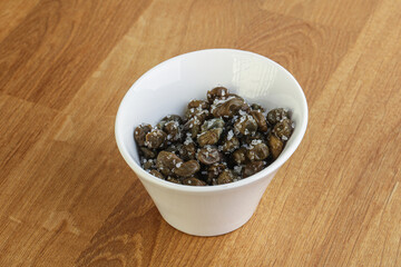 Salted marinated capers snack appetiser