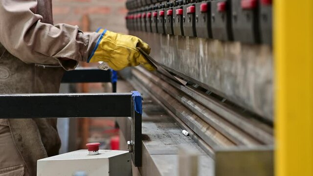 metal bending machine workinfg at the factory