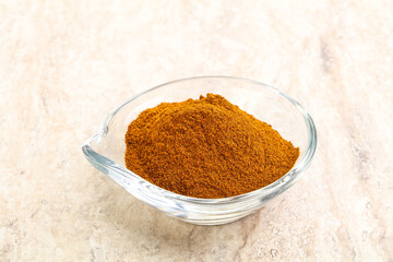 Dry Paprika powder in the bowl