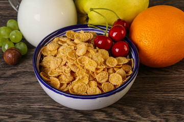 Breakfast with corn flakes and milk