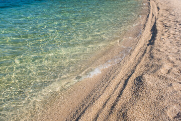 Crystal clear water of Adriatic sea and sand