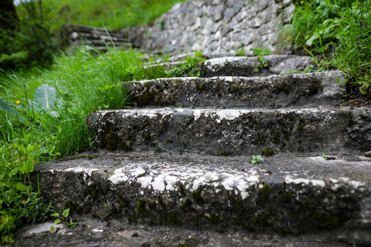 Shallow depth of field (selective focus) image with medieval stone steps from inside the Bran Castle, known also as Dracula’s Castle in Transylvania, Romania.