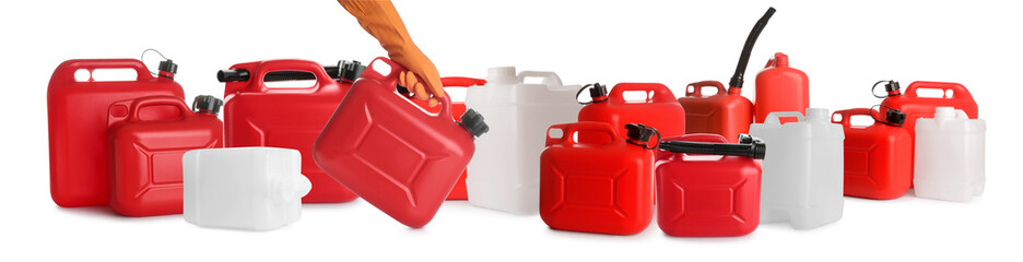 Hand with plastic jerrycans on white background