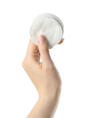 Female hand with cotton pads on white background
