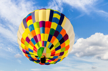 European hot air balloon festival. Hot air balloon flight over blue sky