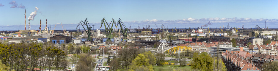 View from the dock to the panorama of the gdansk shipyard, poland. - obrazy, fototapety, plakaty