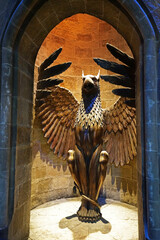 Naklejka premium The phoenix statue stairs at the entrance gate to Dumbledore Hogwarts Headmaster's office at the warner bros studio tour London - The making of Harry Potter- Leavesden, United Kingdom