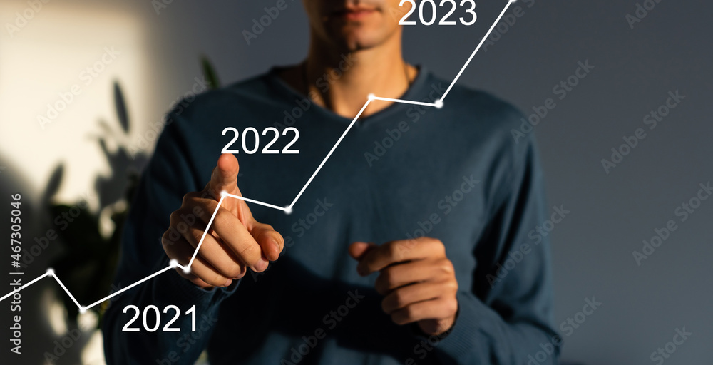Poster businessman hand working with virtual chart business on touch screen computer as concept