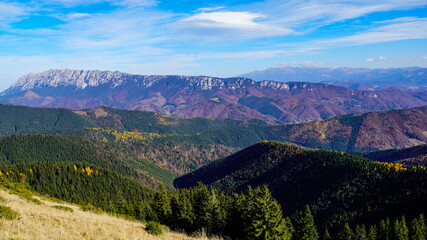 Naklejka premium landscape with mountains and sky, Piatra Craiului Mountains, viewpoint from Papusa Mountains, Romania 