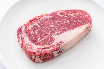 Raw fresh grilled sliced beef prime rib steak with marbling grain