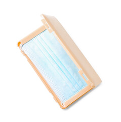 Medical mask with case on white background