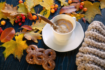 Autumn mood with hot cappuccino coffee with high foam