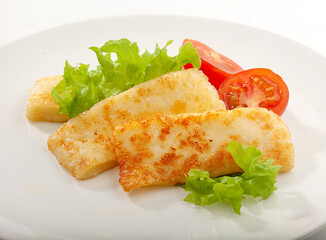 Isolated fried cheese on the palte