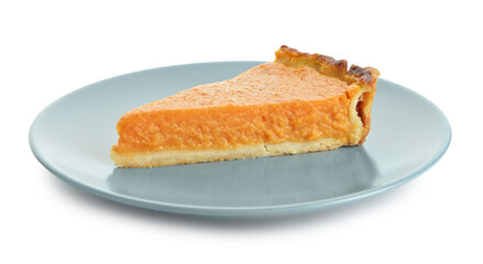 Plate with piece of delicious pumpkin pie on white background