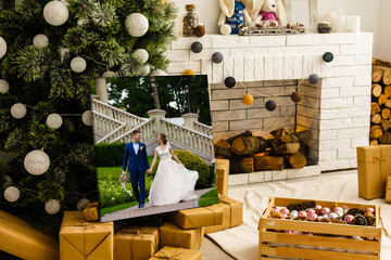 photo canvas wedding on background of christmas interior