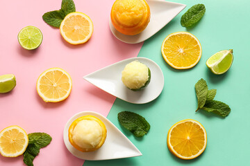 Plate with tasty ice creams in citrus fruit peels on color background