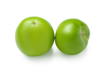 Fresh green tomatoes on white background