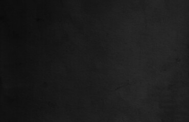 Old black paper texture. Dark wallpaper