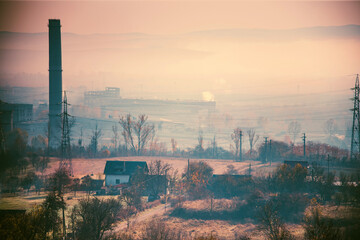 Fototapeta na wymiar Global warming concept with factory zone in fog