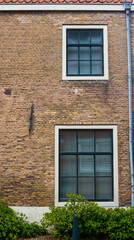 Fototapeta na wymiar brick house with windows