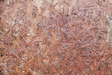 Fiberboard. Compressed light brown wooden texture