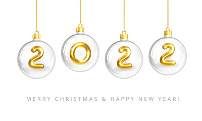 Happy New Year 2022. Hanging Transparent Glass Christmas Balls with Gold Numbers 2022 inside. X-mas decoration isolation on white. For holiday poster, banner, cover.