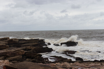 A view of the sea on a embankment of rocks