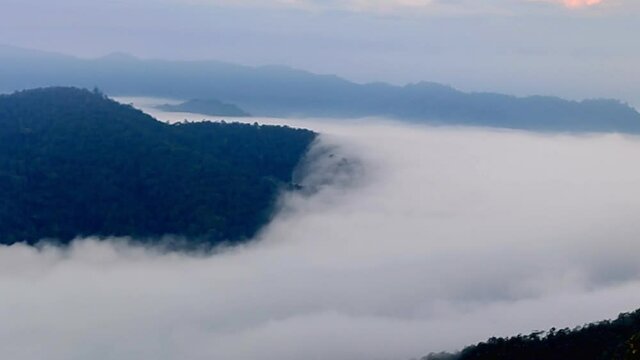 Time Lapse video 4k, Scenery of a Misty morning in the mountains at Huay Kub Kab village, Chiang Mai in northern Thailand.