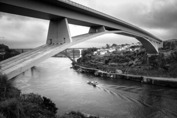 View of the bridge from below - Ponte do Infante in the old town of Porto. Bank of the Duoro River....