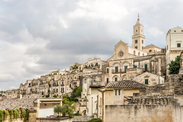 Fototapeta na wymiar View at the Ancient town (Sassi) of Matera with Cathedral of Madonna della Bruna and Saint Eustace - Italy