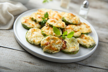Roasted courgette with cheese and herbs