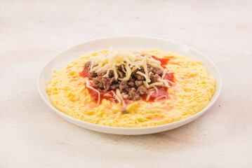 Polenta with tomato, cheese and mince