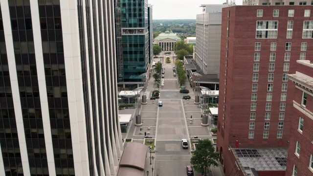 Drone shot of downtown Raleigh North Carolina with capitol building in the distance
