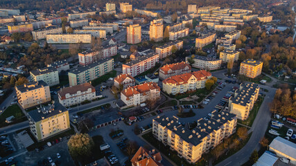 Fototapeta na wymiar Aerial view of Stogi district in Gdansk. A beautiful autumn day. Blocks, streets, road transport.