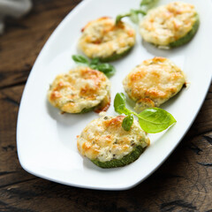 Roasted courgette with cheese and herbs