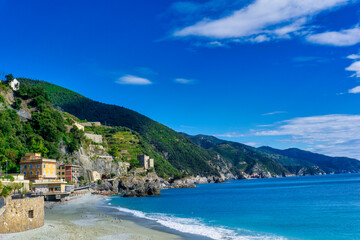 Fototapeta premium all colorful village at the ocean in the mountains of Cinque Terre, Italy