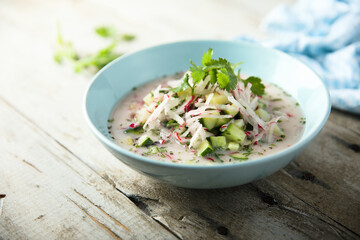 Traditional homemade cold soup with cucumber and radish