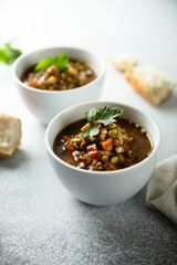 Traditional homemade lentil soup with smoked sausage