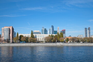 Fototapeta premium Moscow, Russia - October 9, 2021: View of the Berezhkovskaya embankment on an autumn sunny day 
