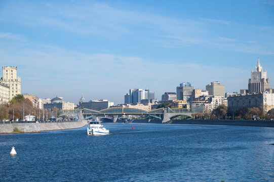 Moscow, Russia - October 9, 2021: View of the Bogdan Khmelnitsky Bridge, Berezhkovskaya and Rostovskaya embankments on an autumn sunny day