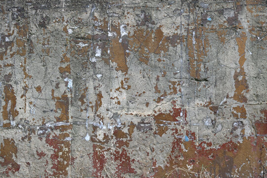 old chipped wall with rough texture - creepy weathered surface for a dystopian background