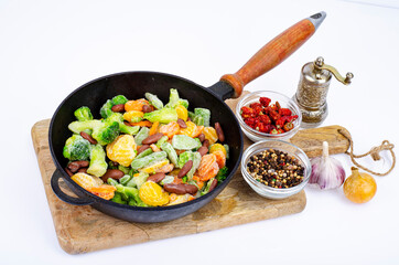 Seasonal vegetables platter in frying pan.Healthy food.Vegetarianism. Studio Photo.