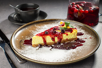 Cheesecake topped with fruit jam, delicious cheesecake with currant jam