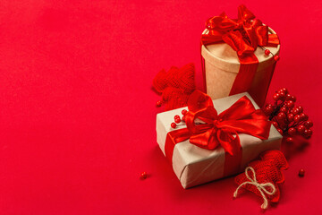 Gift concept in red colors. New Year or Christmas, festive mood