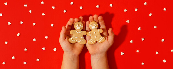 Happy 2022 New Year's set of cookies, gingerbread man, woman in face  from ginger biscuits glazed...